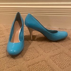 Blue Jessica Simpson pumps with a silver heel. Worn once! Size 9